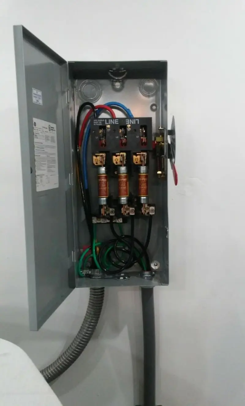 Three-phase disconnect switch installed for Smoke Detector Installation in Evansdale