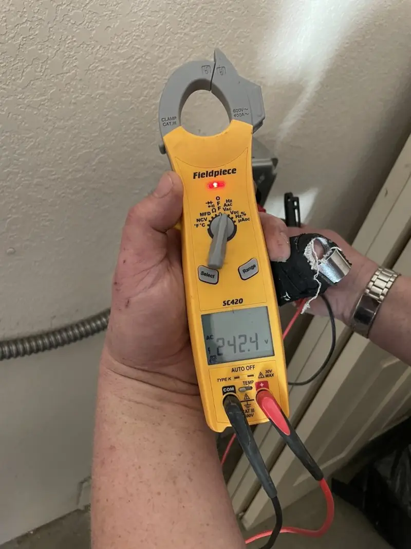 Voltage testing with clamp meter during Hot Tub / Pool Electrical Wiring in Evansdale
